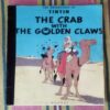 THE CRAB WITH THE GOLDEN CLAWS